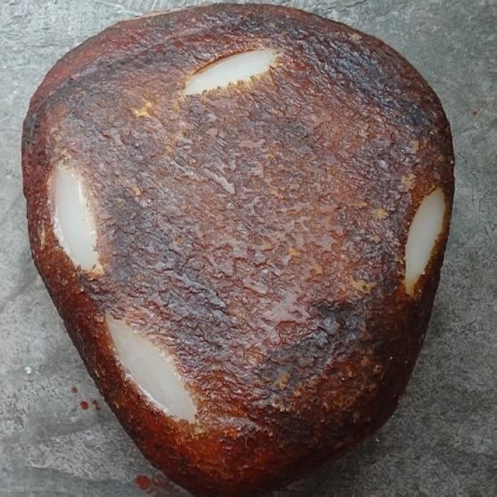 此砾石形玉石大小不一,磨圆茺甚好,多呈浑圆状.