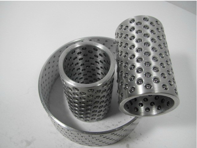 钢珠套主要由基体 钢珠组成,基体按行业标准加工成若干有规律的孔,将